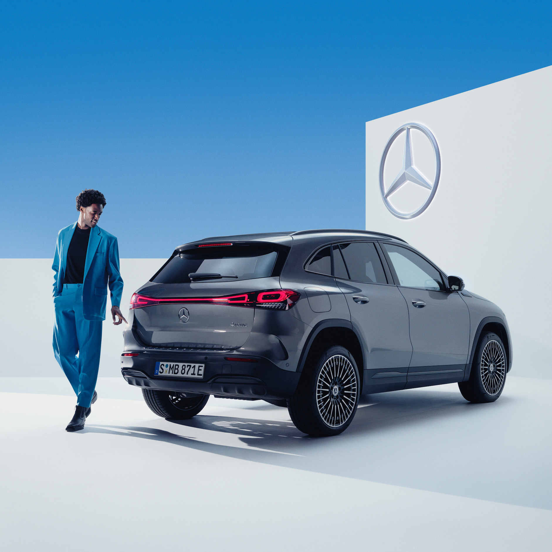 SmallRepair | Mercedes-Benz A man looks at his Mercedes-Benz.